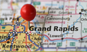 Zoomed in map of grand rapids with a red pin drop in the center