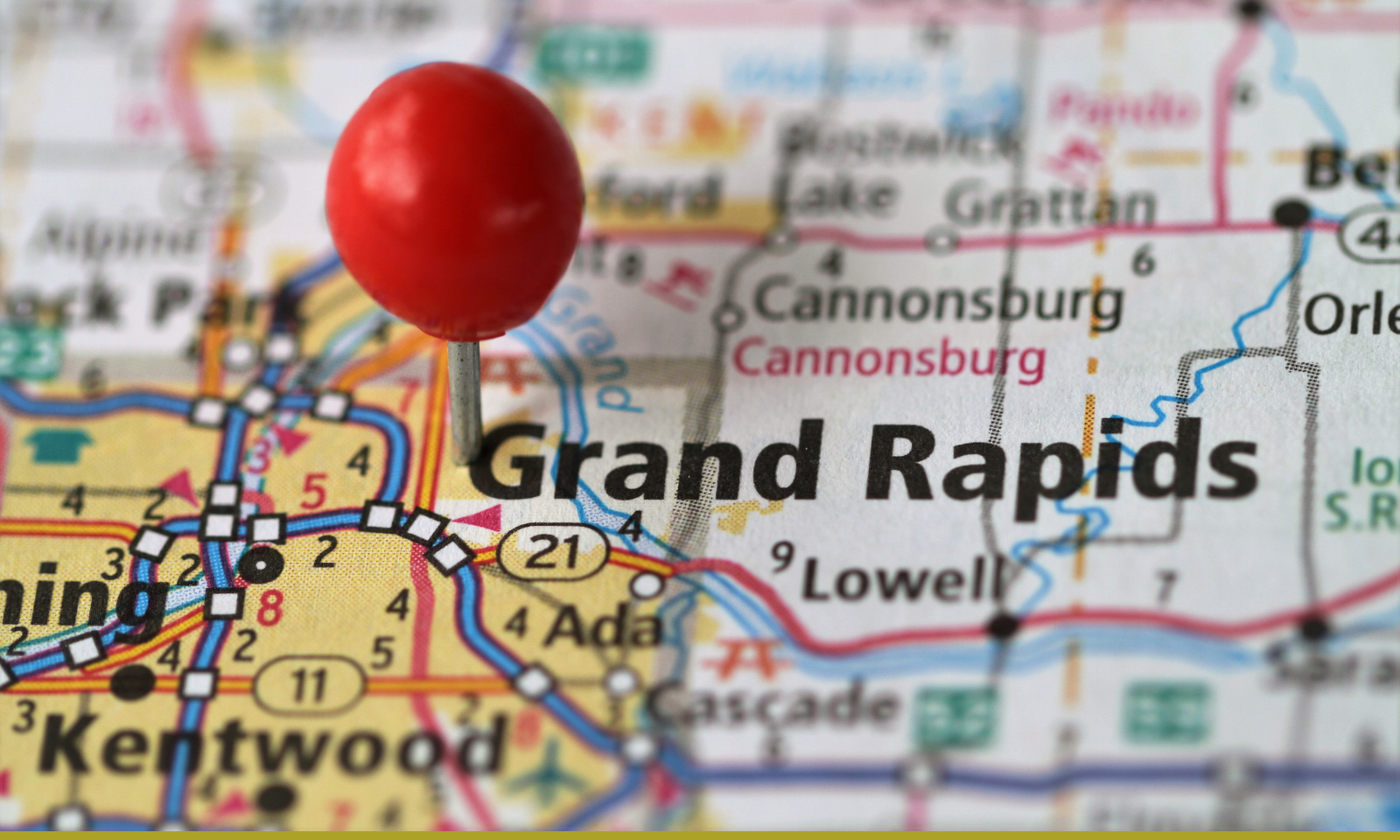 Zoomed in map of grand rapids with a red pin drop in the center